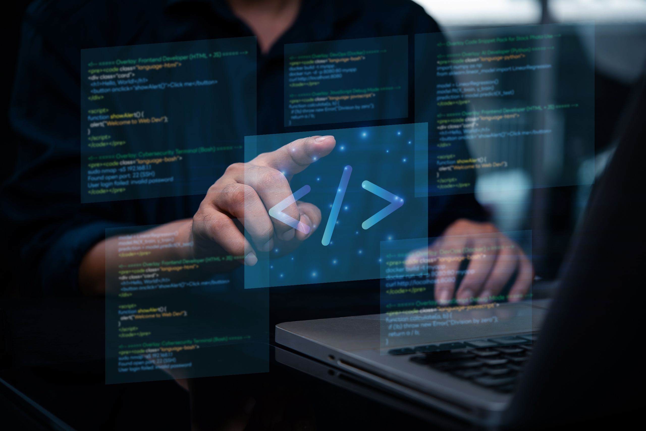 Man sat in front of a laptop with floating code screens in front of them